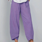 👖 -50% ALENNUS NYT! ✨ Vintage-tyyliset epäsymmetriset housut joustavalla vyötäröllä ja taskuilla – Ainutlaatuinen muotoilu, mukava istuvuus ja käytännöllinen tyyli 🌸