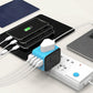Universaali matkapistokeadapteri, jossa on 4 USB-porttia